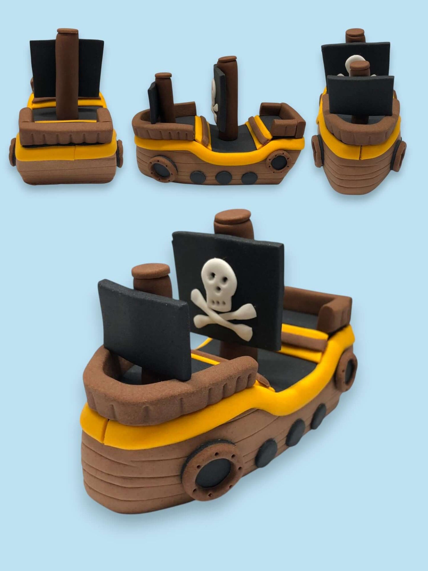 pirate ship with a jolly roger handmade from fondant icing