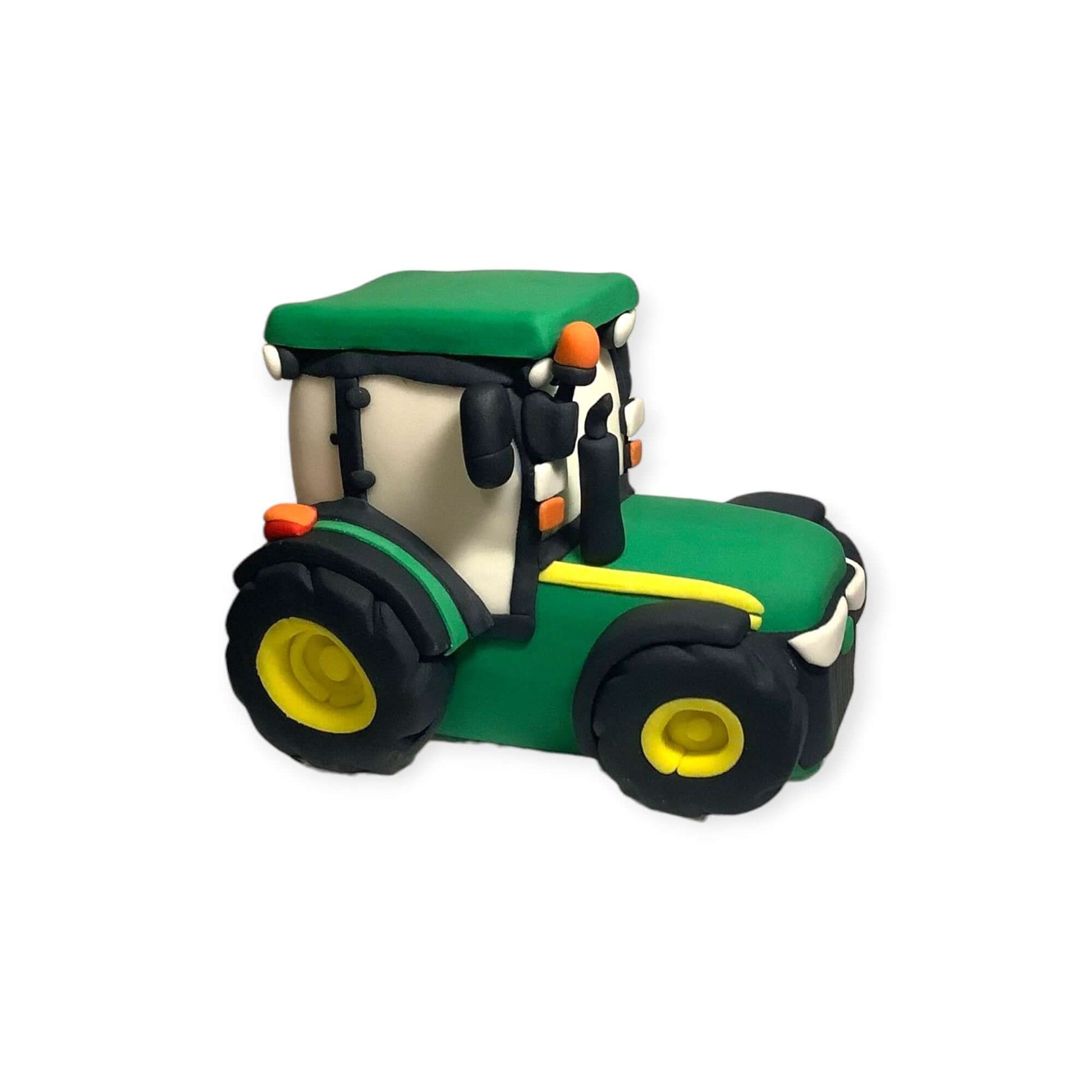 OS view of a detailed handmade fondant tractor figurine 