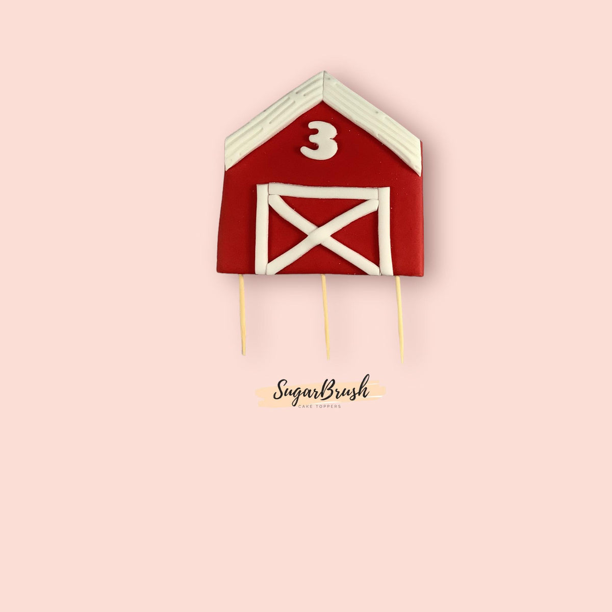 handmade barn with the personalised age and cocktail sticks 