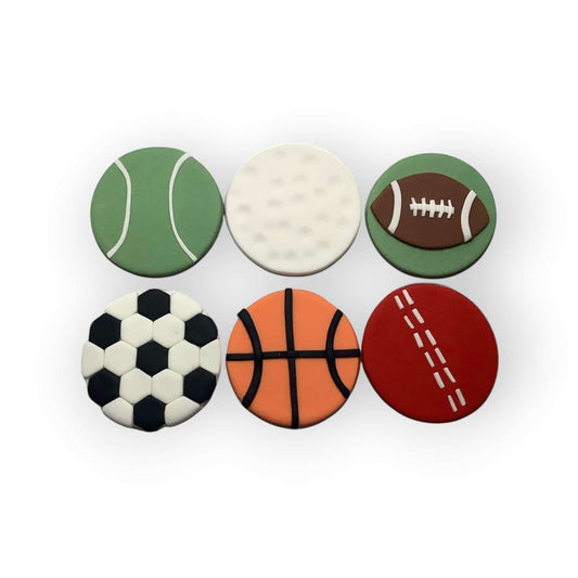 Six sports-themed cupcake toppers on a white background